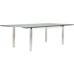 An Octagonal Lucite Legged Rectangular Dining Table