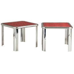 A Pair of Polished Steel Framed Red Faux Snakeskin Lamp Tables