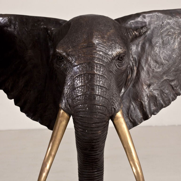 A Pair of Bronze Elephant Heads
