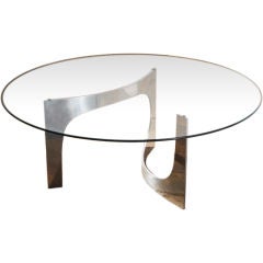 An Abstract Aluminium Based Coffee Table with Circular Glass Top