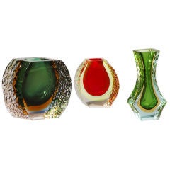 A Collection of Relief Decorated Murano Sommerso Glass Vases