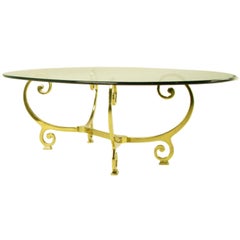 Glass Top Coffee Table With Gracefully Curved Solid Brass Base