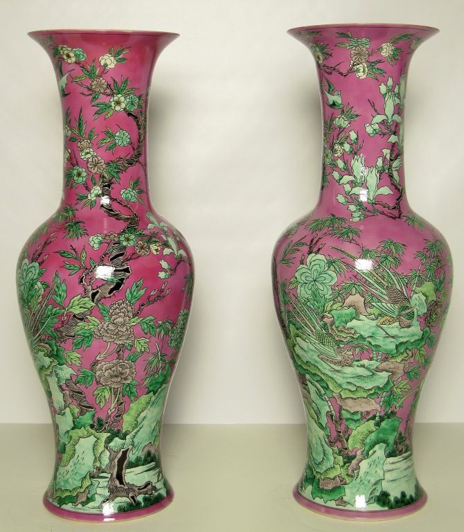 Custom made for the original owner in Hong Kong to match her decor, these large porcelain floor vases are in a traditional Chinese form. Hand painted, with white interior glazing.