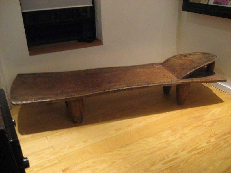 Wonderful and sculptural carved wood African bed