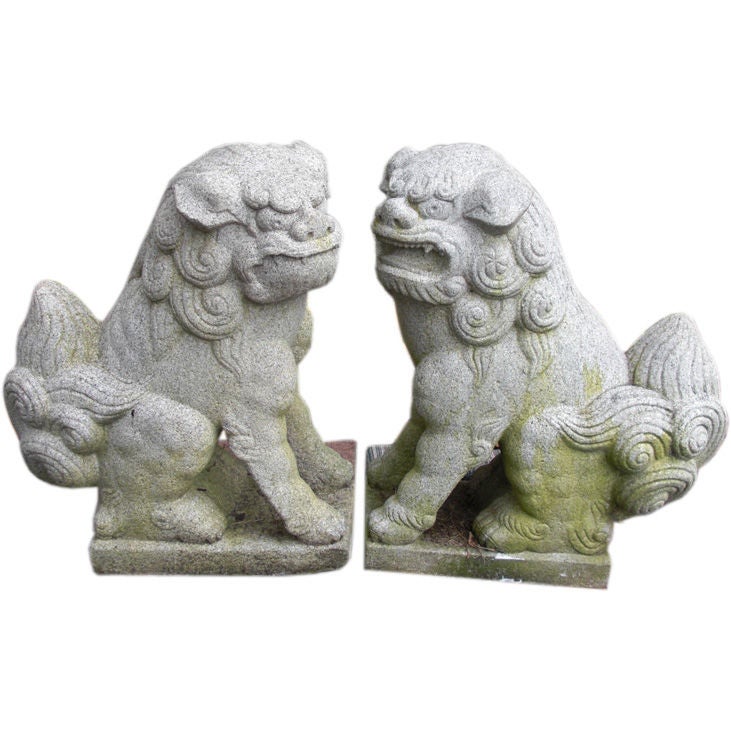 Pair of  granite foo dogs from the Gurdon Wattles estate
