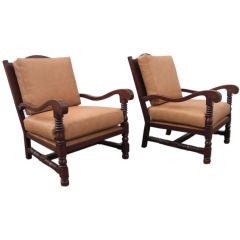Vintage A pair of oak Arts and Crafts armchairs.