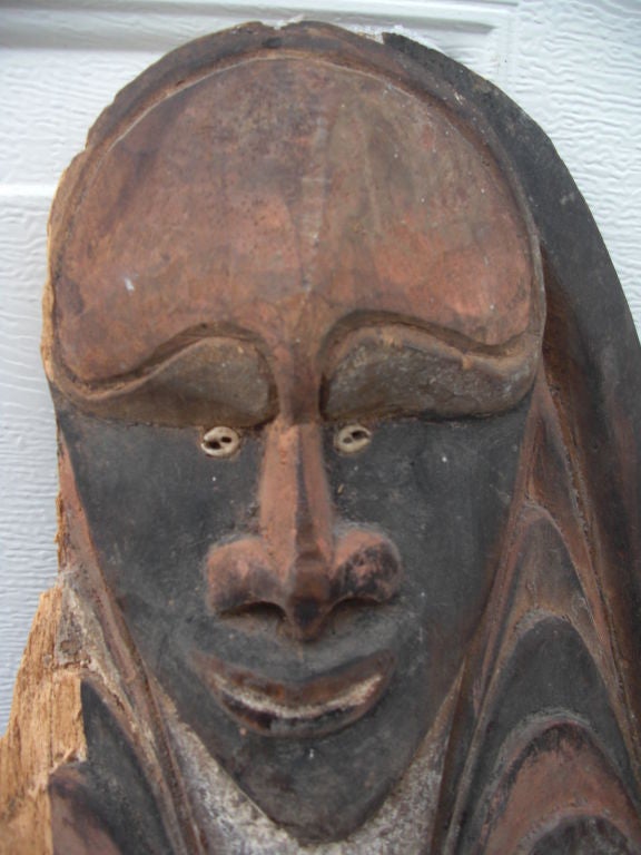 A fantastic and huge ceremonial mask from New Guinea , possibly lower Sepik region. Please read our postings for 3 other New Guinea masks for some further information. Over 5 feet high and great paint. Some significant loss to the proper right side