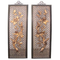 Large pair of carved and gilded antique Chinese panels