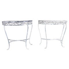 Pair of  wrought iron demi lune tables