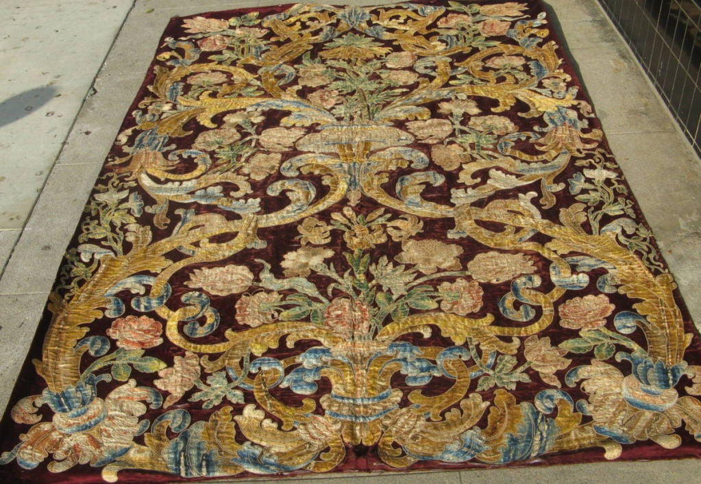 Dramatic European  multi-colored polychrome silk embroidered panel dating to at least the 18th c.  Recently acquired from a large private collection.  Large scale design motif in a exuberant and lavish array of floral bouquets and scroll work. 