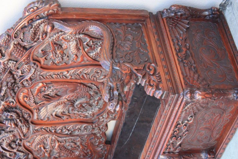 Lavishly detailed with dragons etc decoration, done with crisp carving and a great color.
