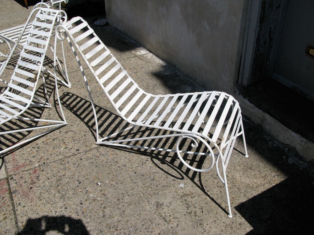 Set of four Modernist outdoor lounge chairs of wrought iron