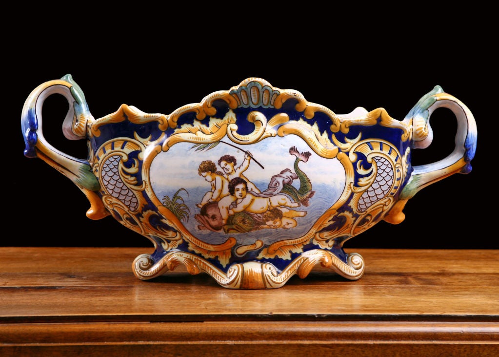 Faience jardiniere or cachepot, hand painted from Nevers in Northern France. Signed A. Montagnon with traditional Bow hallmark, a classic example of fine French pottery by the Antoine Montagnon Factory, circa 1889-1899. Nevers faience manufacture