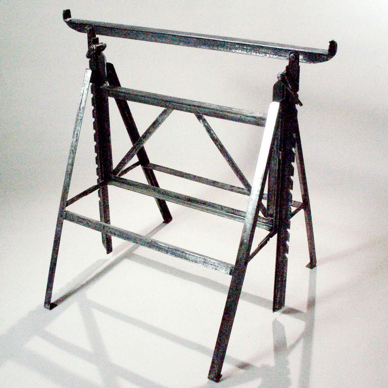 Visually interesting pair of vintage industrial-looking steel legs. Originally used for architect's table, but now would be perfect bases for anything! Open: 41