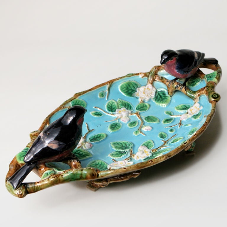 Majolica strawberry server designed with thrush birds perched on twig handles and strawberry flowers on a turquoise ground. Signed: George Jones. Pattern #3349. November 3, 1873.