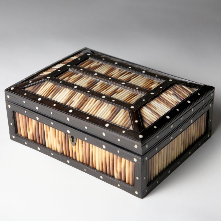 19th Century dome-shaped-top porcupine quill box with ebony and ivory detail. The inside top intricately inlaid with an elephant design and signed: “Ceylon”.  Finer detailed quill boxes like this one were originally made for the English market in