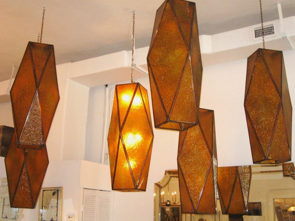 Exceptional set of 6 oversized lanterns, copper frames, amber fiberglass inserts. Amazing volume and form. Superb lighting effect when lite.<br />
For additional, consoles, credenzas, sideboards, bureaus, desks, dressers, commodes, chest of