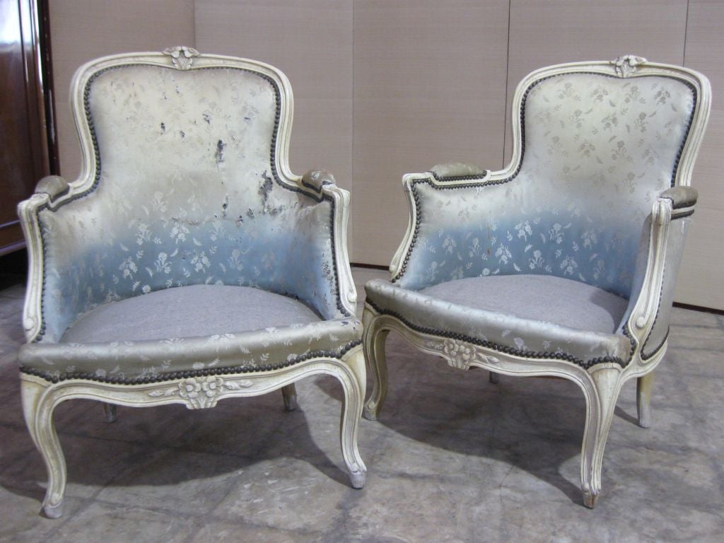 Elegant, petite pair of #french slipper #chairs / #bergeres.<br />
Perfect for a bedroom or #boudoir.For additional, armcahirs, settees, sofas, benches, loveseats, bureaus, commodes, #dressers, #sideboards, #cabinets,#consoles, end, side, center,