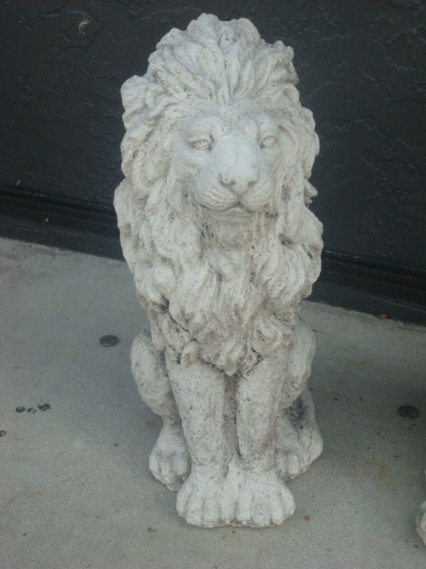 Pair of Carved Stone Regal Lions