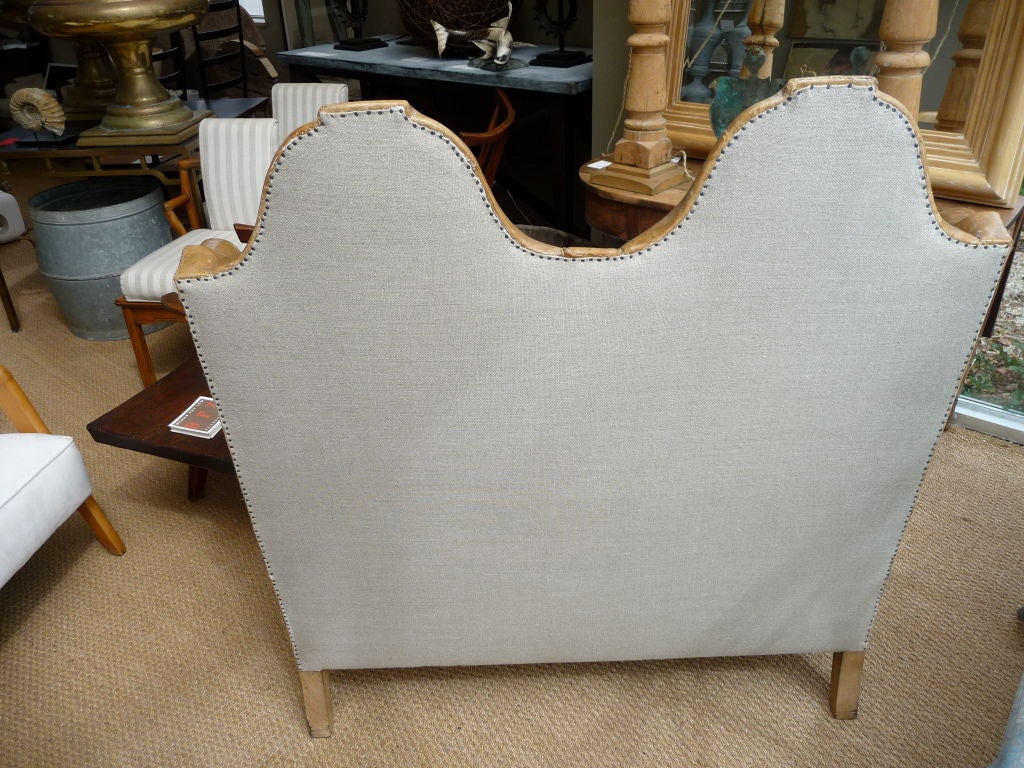 Loveseat Upholstered in Original Toffee Colored Leather. Seat Cushion And Back Newly Upholstered In Natural Linen. Wonderful Distress To Leather. Nailhead Trim.