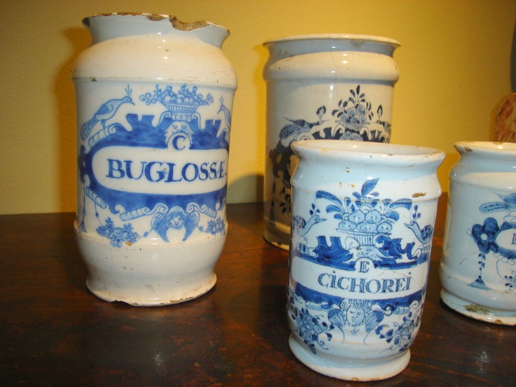 Handsome set of six Blue and White Apothecary Jars . Varying in height from 7 3/4