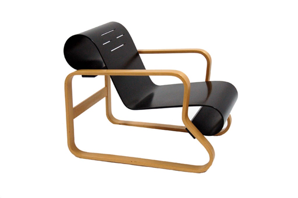 Sculptural scroll chair, black lacquered bent birch on natural birch frame. This example dates from the 1980's, imported by ICF. Made by Artek. This piece has been reduced from $2200 to $1550.