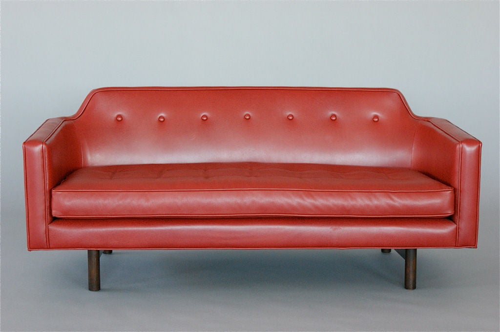 Edward Wormley for Dunbar Settee, curved back 2 Down loose arm or back cushions. Reupholstered in Chinese Red Edleman leather. Arm height 23