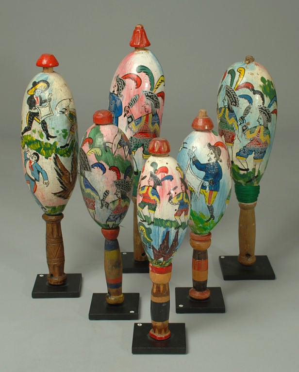 A collection of six great vintage hand painted Guatemalan 'Baile de la Conquista' gourd rattles - each displayed on a high quality custom made stand.<br />
<br />
Dimensions: largest measures 16.75 inches high.<br />
<br />
Condition: overall