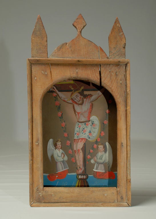 This rare 19th century retablo on tin represents 'El Señor de Saucito,' an ancient Spanish devotion to Cristo, which a devotee wished to replicate when he found a naturally shaped crucifix in a tree called a 