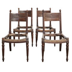 A set of four Regency mahogany Hall Chairs