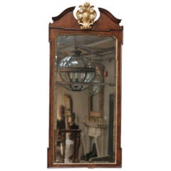 A walnut and parcel gilt Pier Mirror