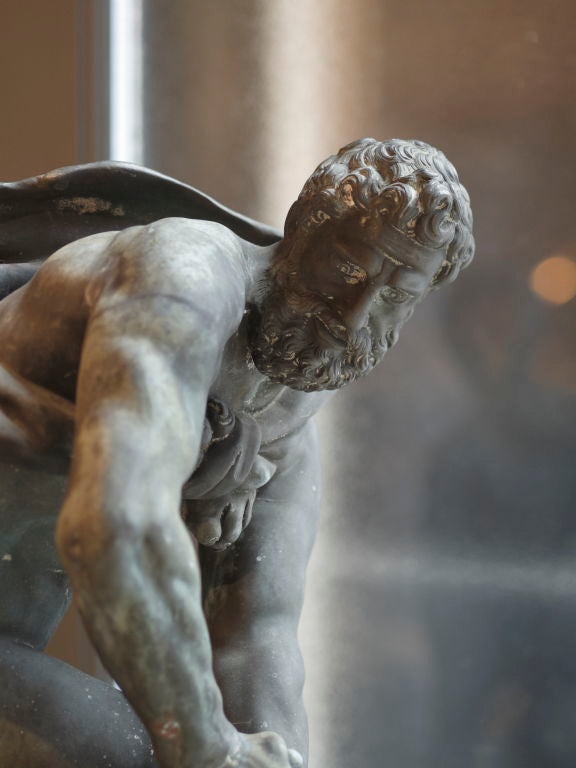 After Ferdinando Tacca.<br />
The seventh Labour of Hercules, who was sent to Crete to capture the mad bull belonging to King Midas. Though it belched flames he succeeded after a great struggle and took it back to Greece.