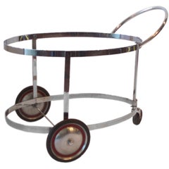 Used Machine age art deco two tier chrome drinks cart in the style of Gilbert Rohde 