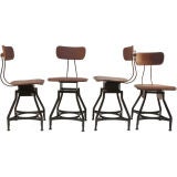 4 Industrial Stools in old red paint surface
