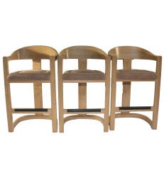 Karl Springer "Onassis" stools in oak