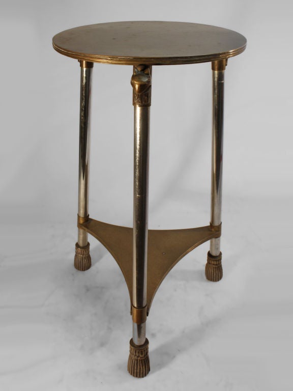 Chrome and Brass Art Deco Taboret  - chrome plate legs, with brass top,shelves, and feet - legs surmounted with Gargoyle heads