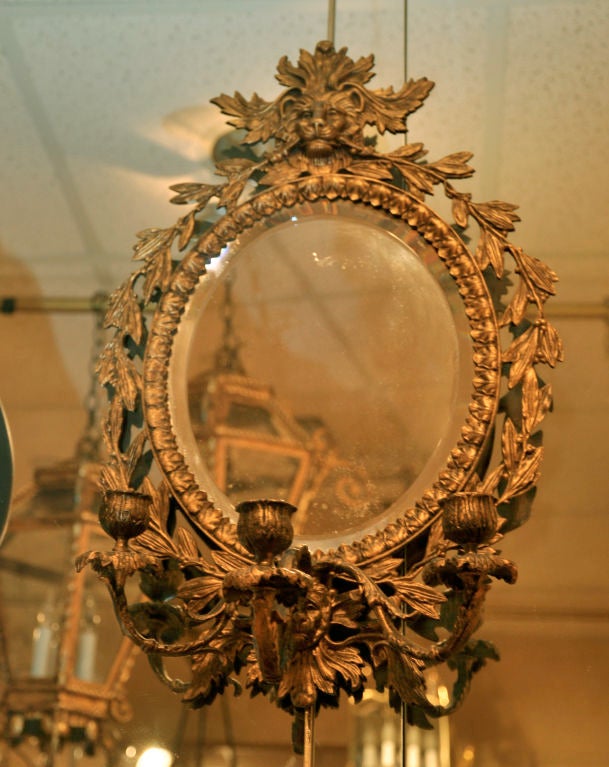 THREE ARM BRONZE SCONCES WITH MIRROR INSET