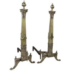 A Pair of Brass and Iron Continental Chenets or Andirons