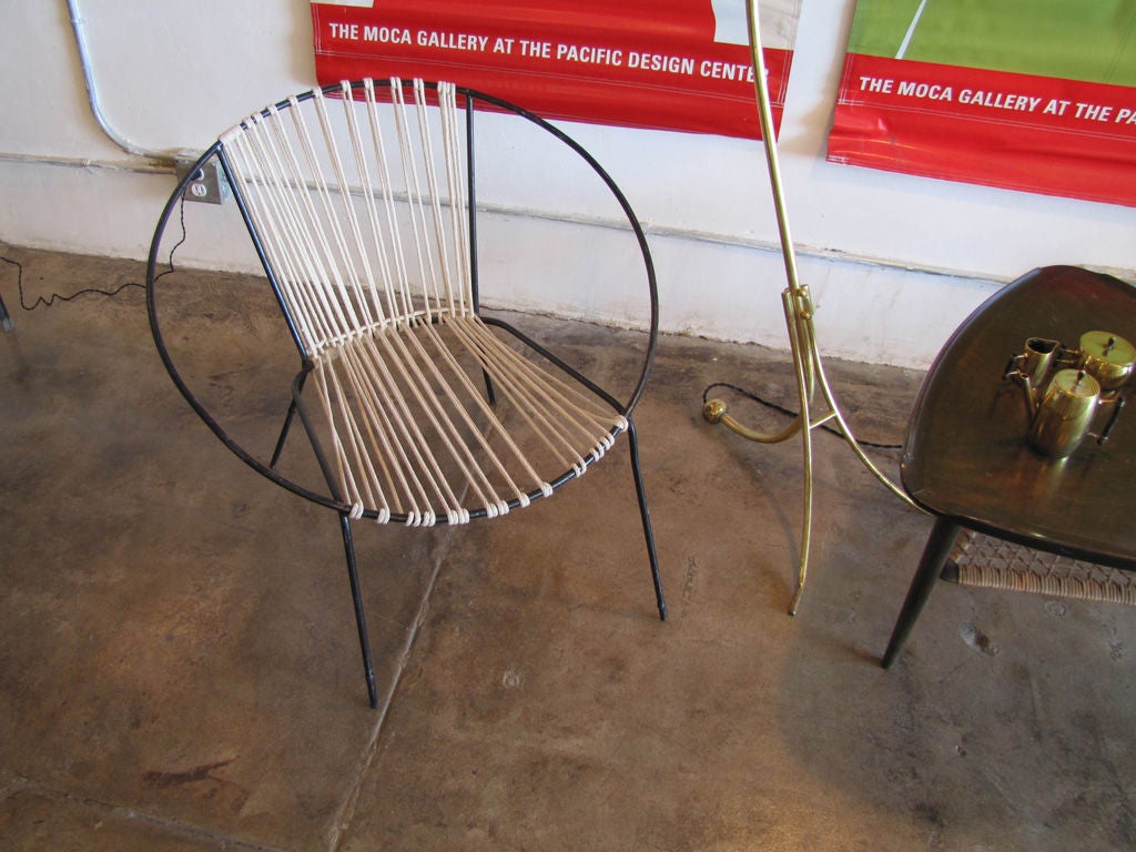 pair of iron hoop chairs with roped seating