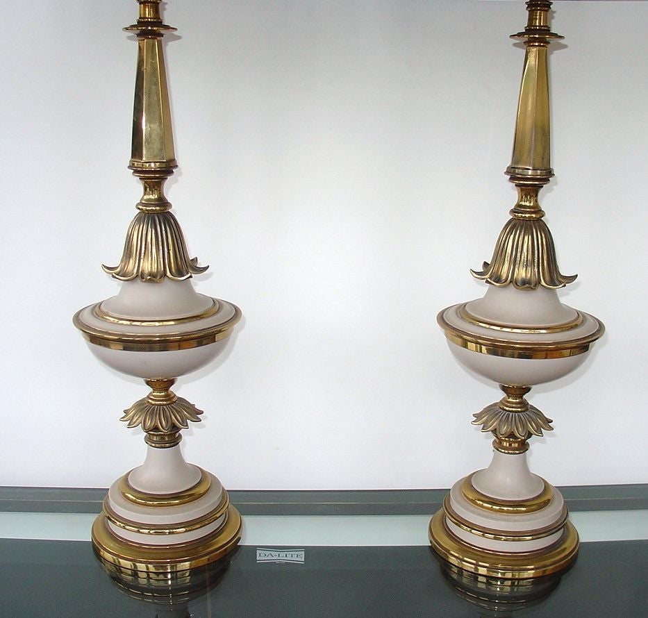 An elegant pair of tall Stiffel lamps in brass and enamel.