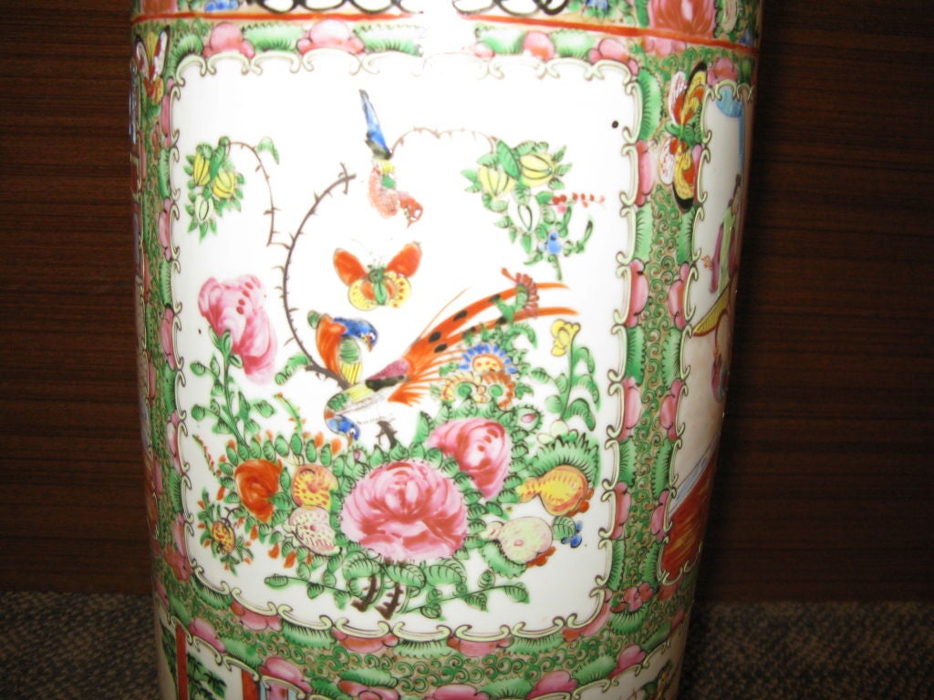 A very decorative and useful Chinese umbrella stand, in great condition with no cracks.<br />
<br />
Late 19th - Early 20th century<br />
<br />
With design in reserves of flowers and birds, and scenes of figures, surrounded by vine and flower