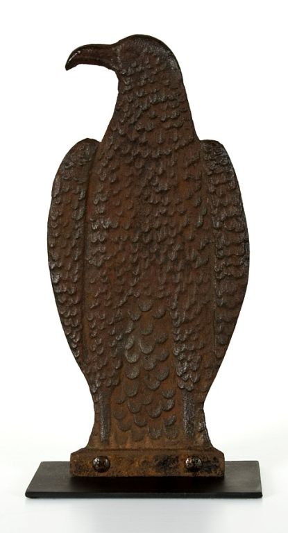 This wonderful casting, with details front and back, is documented in “Windmill Weights” by Simpson (1985, Johnson & Simpson in conjunction with the Museum of American Folk Art, p. 73). Simpson states that this is the only known form of windmill