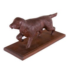 HAND-CARVED, WOODEN SETTER OR SPANIEL DOG IN RED PAINT