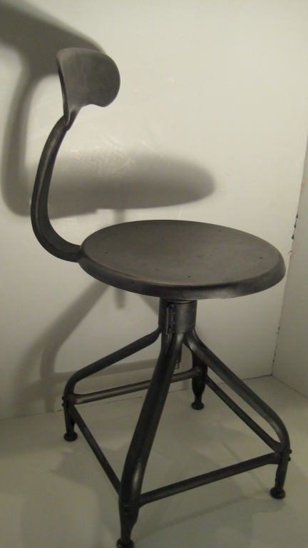 Beautiful industrial metal kidney back chairs. Adjustable seat height ranges from 17