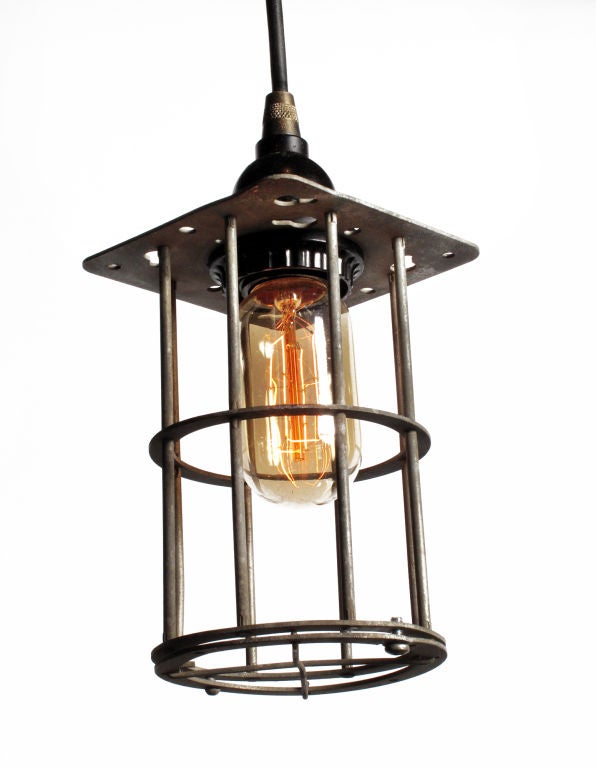 Industrial utility caged pendants lights. Adjustable height up to 8 feet. Priced Individually.