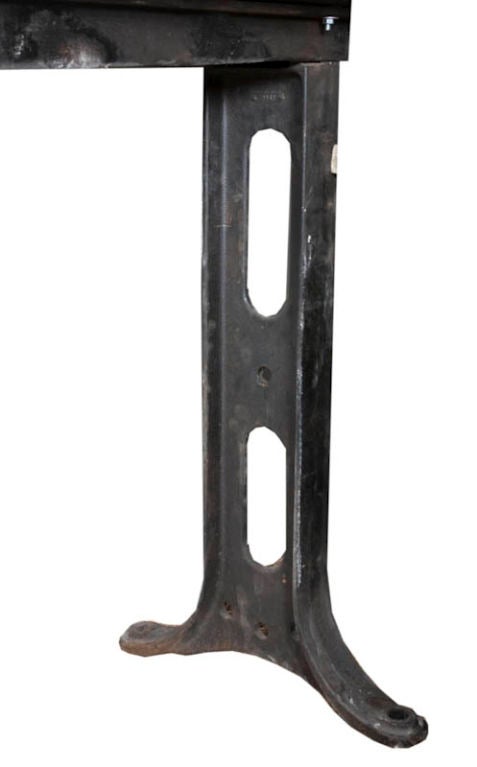 Industrial metal base console table with an elegant smooth white marble top.