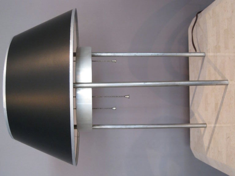 Rare and important three legged satin chrome table lamp designed in 1941 by Benjamin Baldwin and produced by Hansen. This lamp has three bulbs each with its' own chain pull.  Original condition. Shade is new but is an exact copy of the original