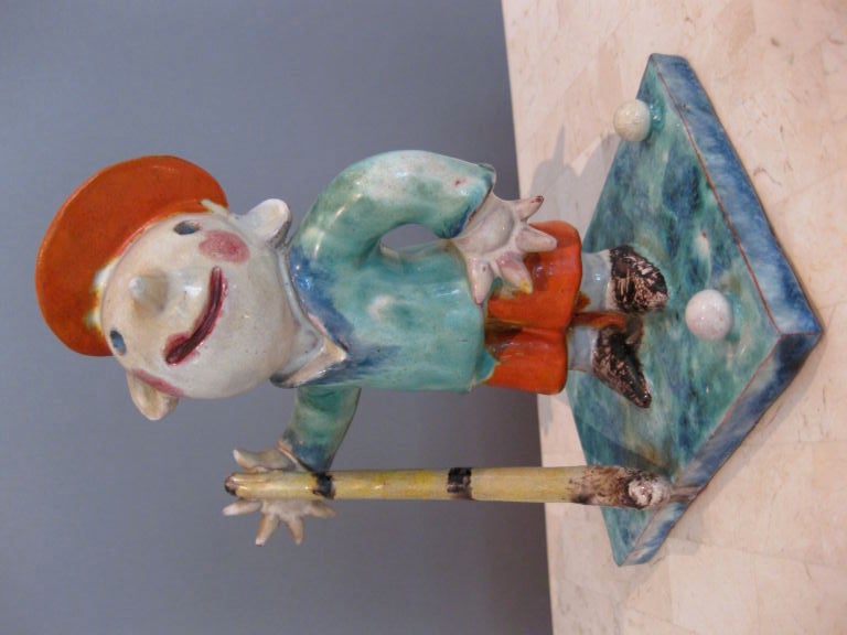 Glazed ceramic figure of a golfer designed by Walter Bosse and made in Austria for the Wiener Werkstatte c.1920's. Stamped underneath 