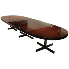A Large Oval DIning Table in Macassar Ebony