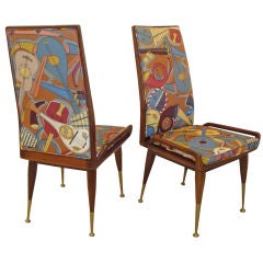 A Pair of Mid Century Side Chairs with Upholstery by Fornasetti